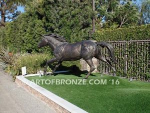 Finish Line bronze sculpture of running Arabian horse for ranch or equestrian center