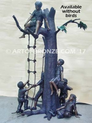 Natures Playground monumental sculpture of children playing in bronze tree