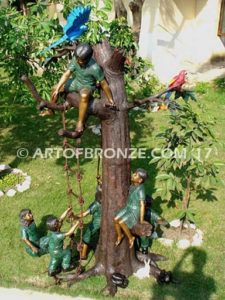Natures Playground monumental sculpture of children playing in bronze tree