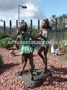 Ring Around fountain sculpture of three girls holding hands and dancing around