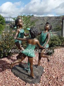 Ring Around fountain sculpture of three girls holding hands and dancing around
