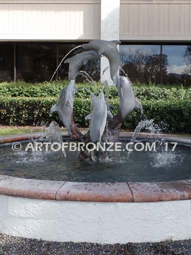 Round and Round bronze fine art gallery sculpture of dolphins, whales and porpoises