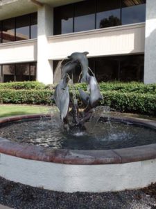 Round and Round bronze fine art gallery sculpture of dolphins, whales and porpoises