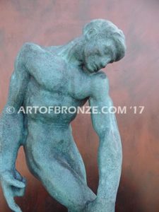 Adam Auguste Roding bronze statue of standing male nude pointing finger down