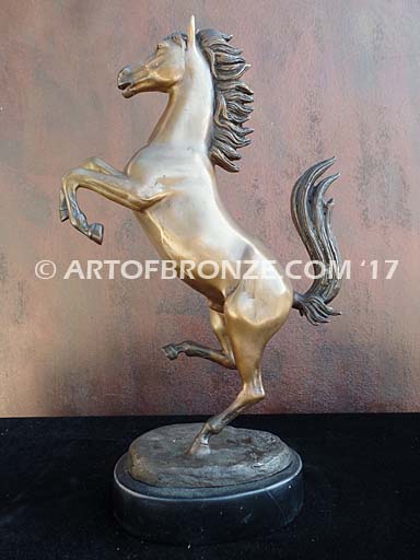 Legendary Spirit sculpture of reared horse on one leg attached to a marble base