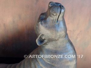 Sunbather bronze sea lion and seal mascot sculpture for zoo, university or school mascot