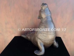 Sunbather bronze sea lion and seal mascot sculpture for zoo, university or school mascot