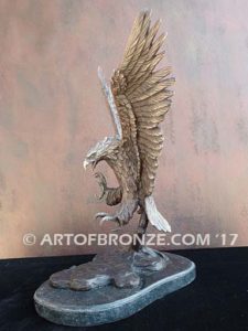 Bronze sculpture of nostalgic like Harley Davidson flying bald eagle for indoor or outdoor display