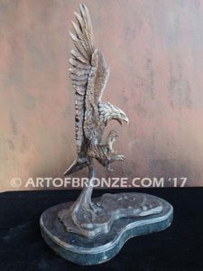 Bronze sculpture of nostalgic like Harley Davidson flying bald eagle for indoor or outdoor display