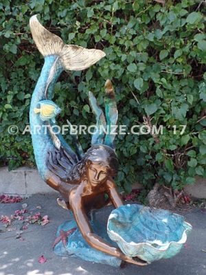 Bronze mermaid sculpture holding oyster shell for pond, pool or aquatic display