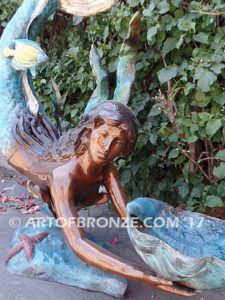 Bronze mermaid sculpture holding oyster shell for pond, pool or aquatic display