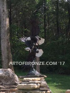 Fish Thieves bronze sculpture of monumental eagles fighting over captured salmon