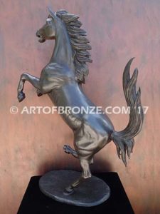 Legendary Spirit sculpture of reared horse on one leg attached to a marble base