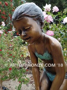 Pond Fun bronze sculpture of young girl in bathing suit playing with bullfrog