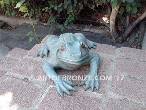 Bronze sculpture of resting frog for outdoor pond, pool or aquatic display