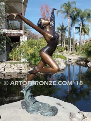 Harmony Light the art of dance and ballet bronze sculpture showing leaping ballerina