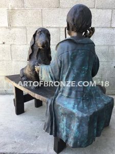 Future Vet bronze sculpture of veterinarian boy with stethoscope and dog on bench