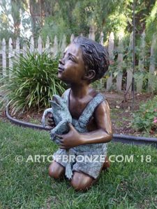 Little Prince sculpture of bullfrog and boy