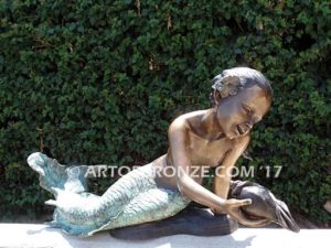 Bronze mermaid sculpture holding oyster shell for pond, pool or aquatic display