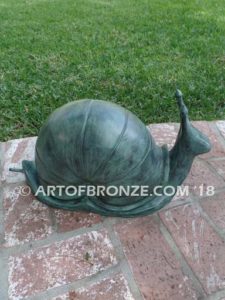 On the Move bronze snail artwork for outdoor garden or indoor display