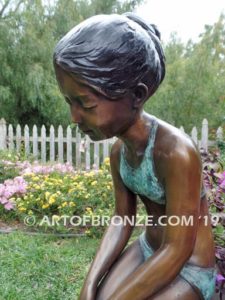 Prince Charming bronze sculpture of bullfrog and girl in bathing suit