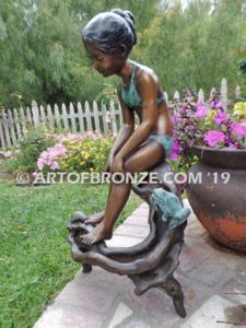 Prince Charming bronze sculpture of bullfrog and girl in bathing suit