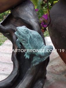 Prince Charming bronze sculpture of bullfrog and girl in bathing suit