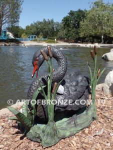 Black Swan outdoor life-size statue of swan and playing cygnets
