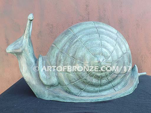 On the Move bronze snail artwork for outdoor garden or indoor display