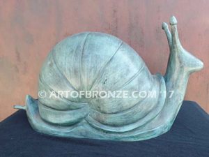 On the Move bronze snail artwork for outdoor garden or indoor display