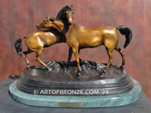 L’Accolade equestrian sculpture of standing stallion and Arabian mare from French animalier artist P.J. Mene.