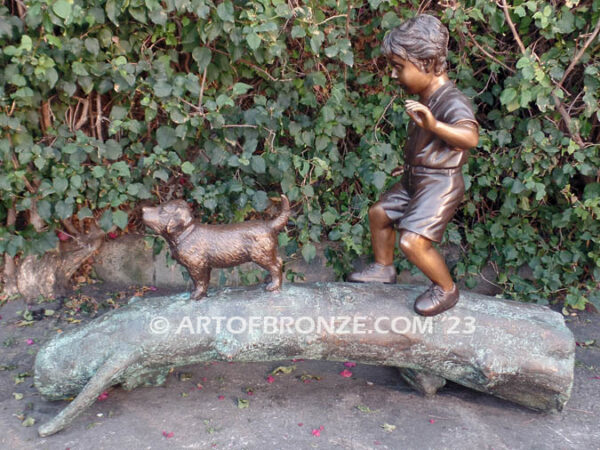 Adventurous Pals Bronze monumental sculpture for garden or yard of boy and dog crossing bronze log