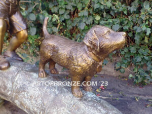 Adventurous Pals Bronze monumental sculpture for garden or yard of boy and dog crossing bronze log