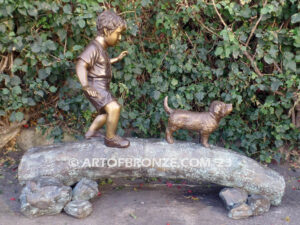 Adventurous Pals Bronze monumental sculpture for garden or yard of boy and dog crossing bronze log