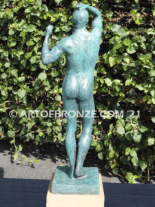 Age of Bronze figurative bronze statue of nude male with tightened musculature and twisting body