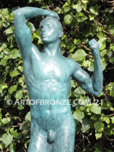 Age of Bronze figurative bronze statue of nude male with tightened musculature and twisting body