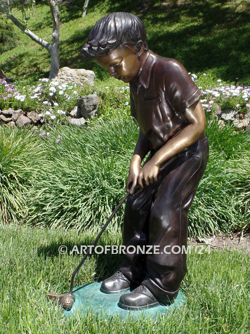 All Lined Up bronze sports statue of golfer boy putting golf ball