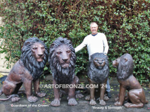 Beauty & Strength high quality cast bronze African lion pair sitting next to each other