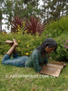 Best in Her Class bronze sculpture of young girl reading her favorite novel