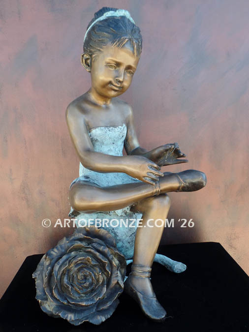 Blooming Youth bronze statue of young ballerina sitting tying her slipper