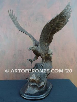 Bronze sculpture of flying eagle on custom marble base