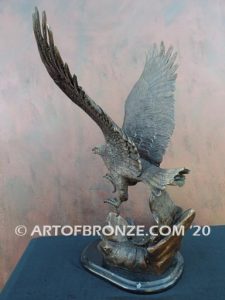 Bronze sculpture of flying eagle on custom marble base