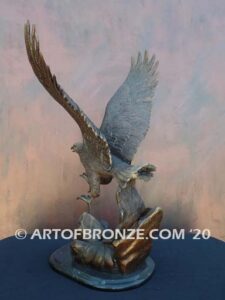 Bronze sculpture of flying eagle on custom marble base