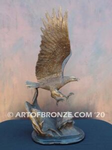 Bronze sculpture of flying eagle on custom marble base