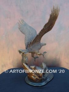 Bronze sculpture of flying eagle on custom marble base