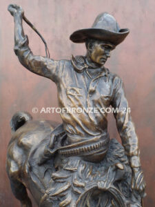 The Buckaroo bronze statue after Phimister Proctor featuring cowboy on horse