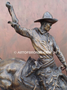 The Buckaroo bronze statue after Phimister Proctor featuring cowboy on horse