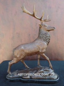bull elk standing on rocky base design with head raised in bugling position bronze sculpture