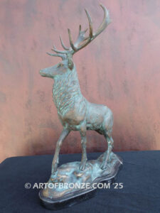 bull elk standing on rocky base design with head raised in bugling position bronze sculpture