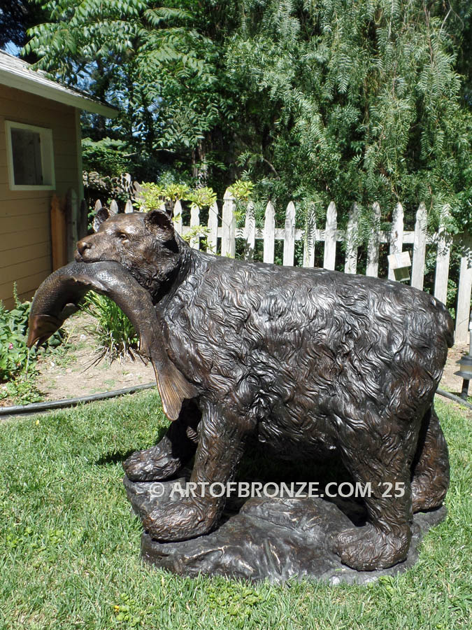Catch of the Day monumental outdoor bear with salmon fish in his mouth bronze sculpture